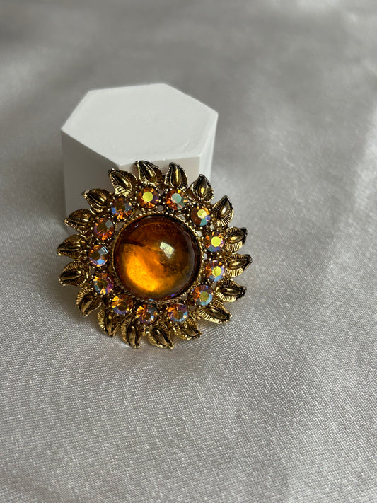 Broche vintage doré et strass style soleil fleur