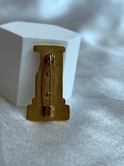 Broche vintage « un jours ailleurs » doré femme