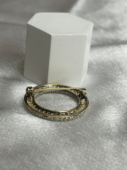 Broche vintage cercle argenté et strass en argent 925