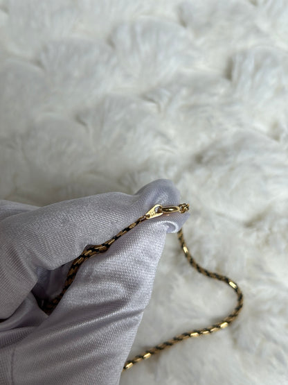 Jolie collier chaîne vintage torsadé noir et doré