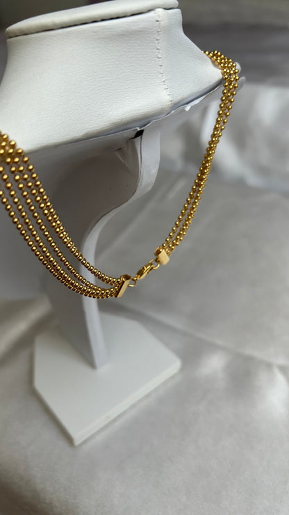 Splendide collier vintage boules doré signé motivex