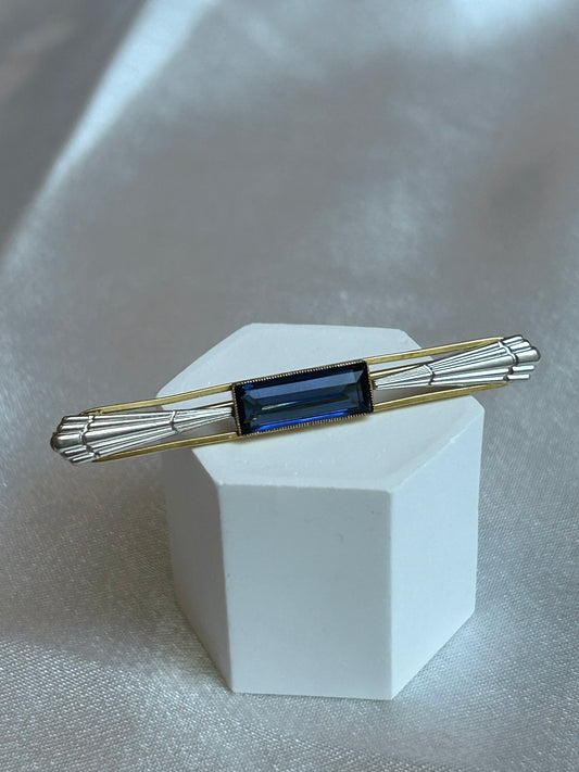 Broche vintage plaqué or bicolore « ORIA » et pierre bleue