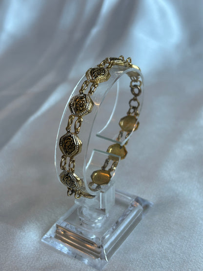 Bracelet en or de Tolède vintage femme de seconde main fleur