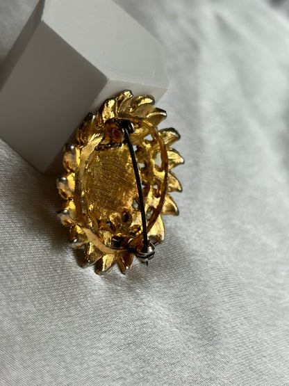 Broche vintage doré et strass style soleil fleur
