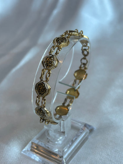 Bracelet en or de Tolède vintage femme de seconde main fleur