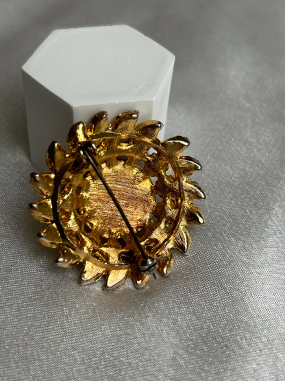 Broche vintage doré et strass style soleil fleur