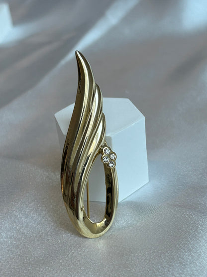 Broche vintage doré à strass goutte