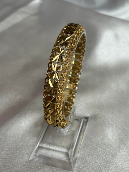 Bracelet vintage plaqué or femme ciselé