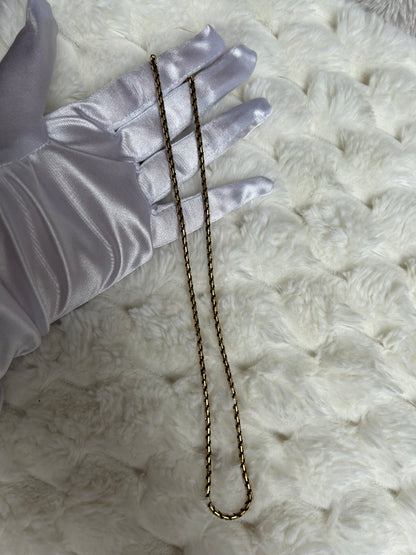 Jolie collier chaîne vintage torsadé noir et doré