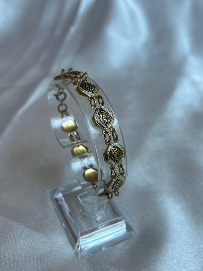 Bracelet en or de Tolède vintage femme de seconde main fleur