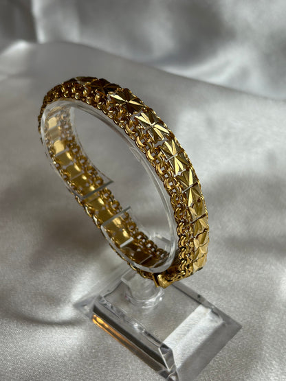 Bracelet vintage plaqué or femme ciselé