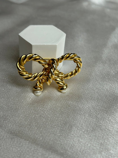 Broche vintage doré modèle noeud et perles