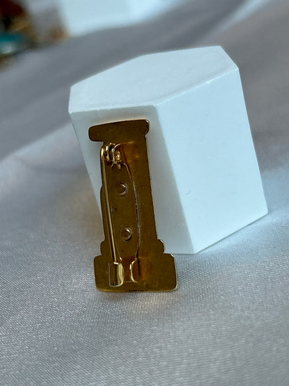 Broche vintage « un jours ailleurs » doré femme