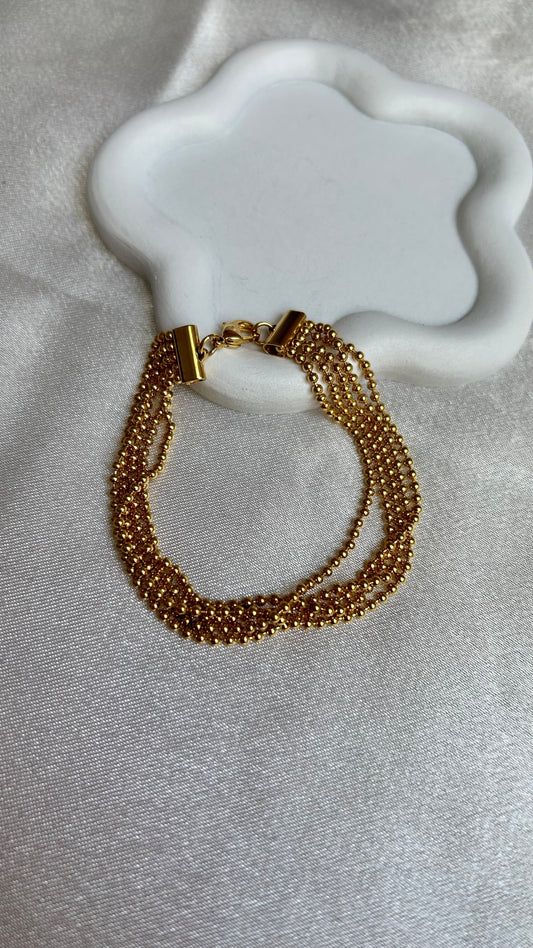 Bracelet vintage à boules d’or motivex