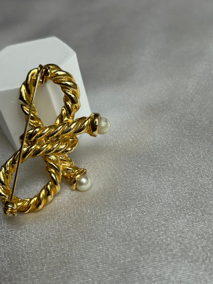 Broche vintage doré modèle noeud et perles