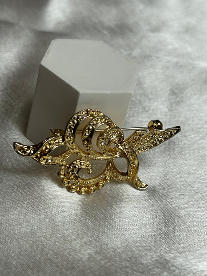 Broche vintage doré et strass