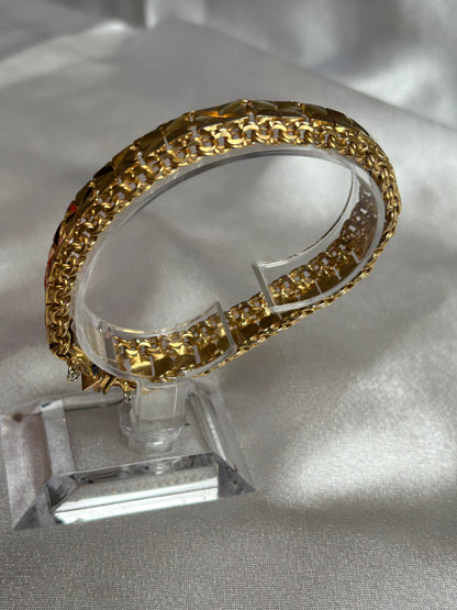 Bracelet vintage plaqué or femme ciselé