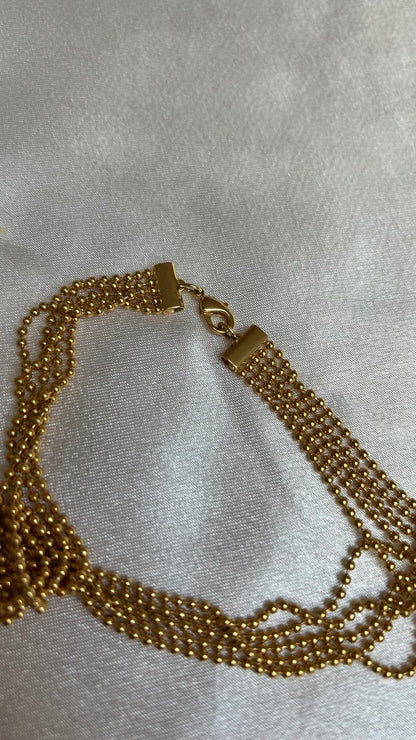 Splendide collier vintage boules doré signé motivex