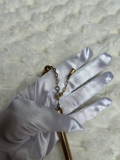 Jolie collier vintage doré ras de coup