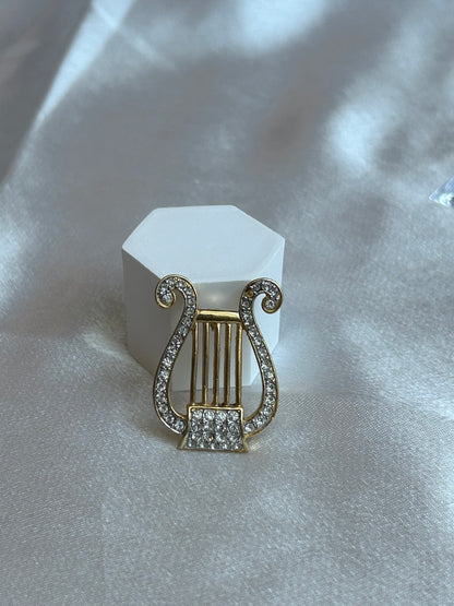 Broche vintage atypique note de musique et strass