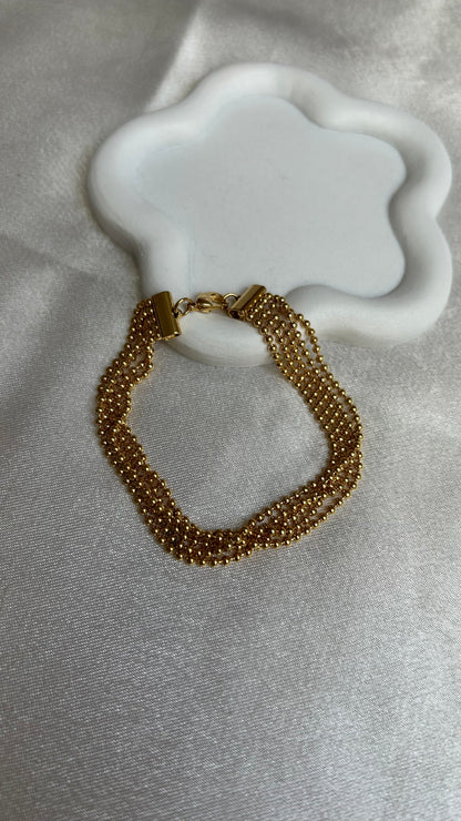 Bracelet vintage à boules d’or motivex