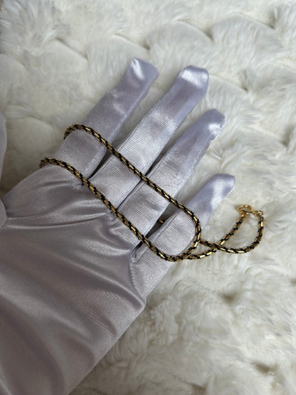 Jolie collier chaîne vintage torsadé noir et doré