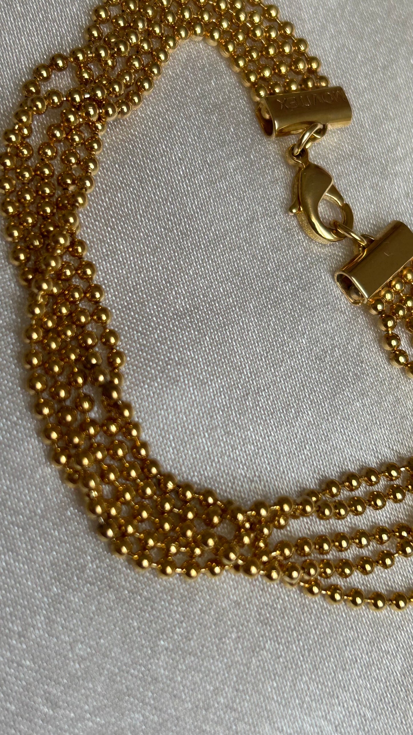 Bracelet vintage à boules d’or motivex