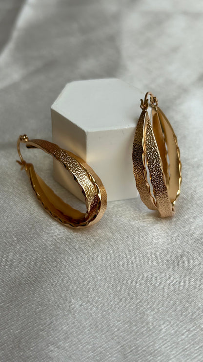 Créoles vintage dorées mailles entrelacées