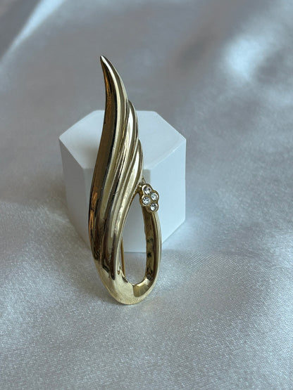 Broche vintage doré à strass goutte