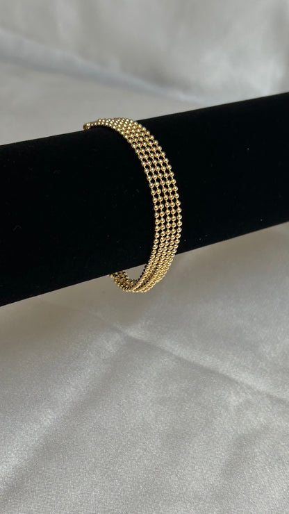 Bracelet vintage à boules d’or motivex