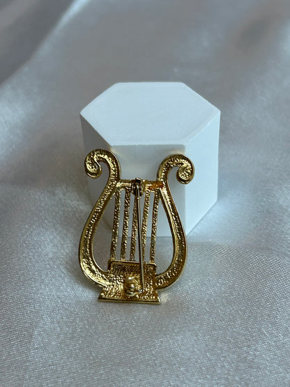 Broche vintage atypique note de musique et strass