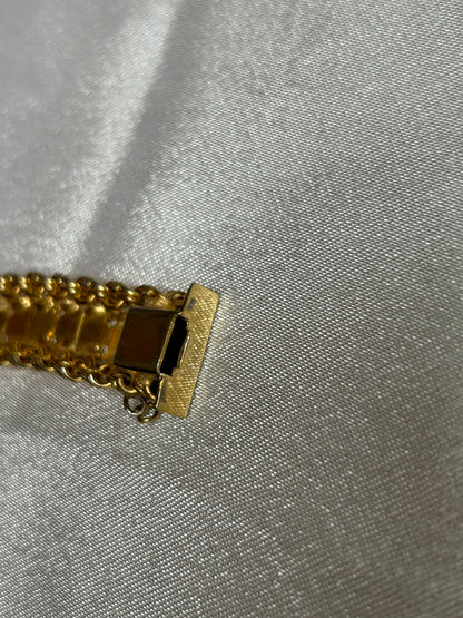 Bracelet vintage plaqué or femme ciselé