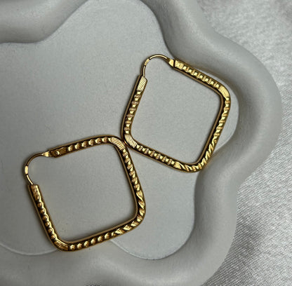 Boucle d’oreille style créoles losange en plaqué or