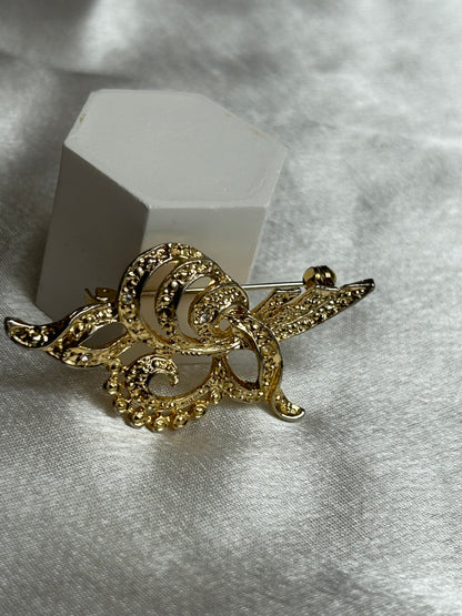 Broche vintage doré et strass
