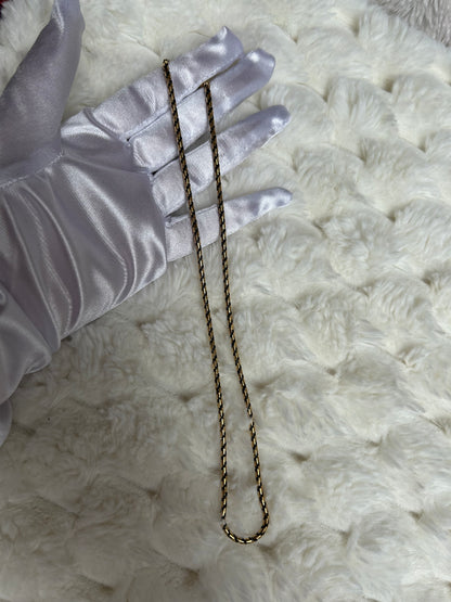 Jolie collier chaîne vintage torsadé noir et doré