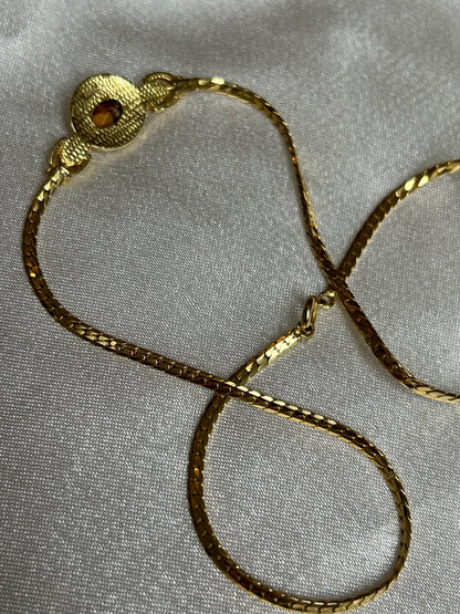 Collier vintage doré et pierre bleu avec strass