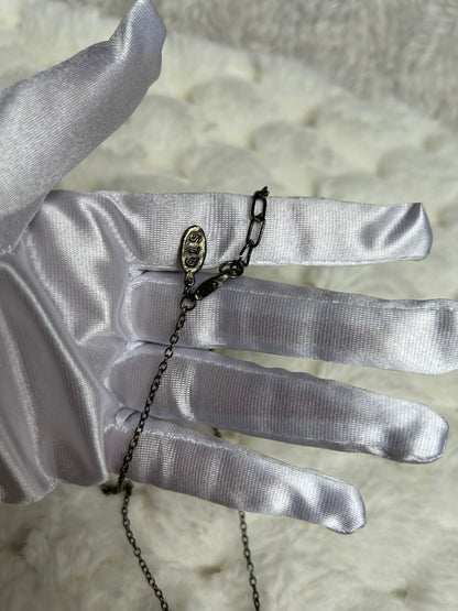 Jolie collier vintage à fleur noir et strass noir